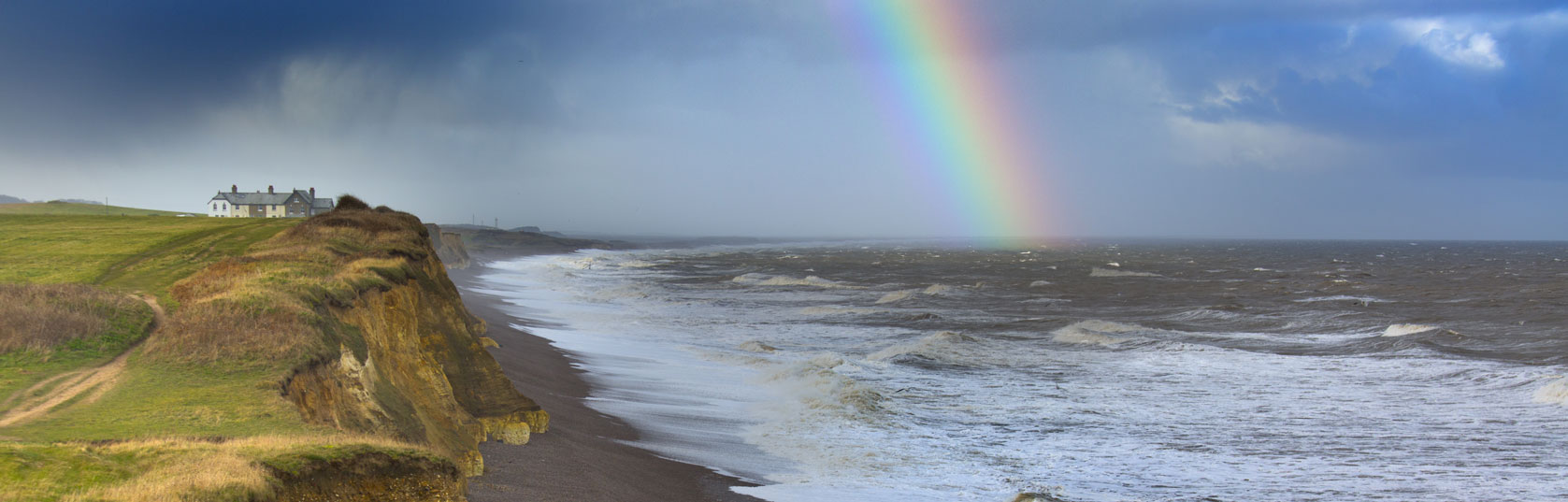 Rainbow off Weybourne, Norfolk in rain storm